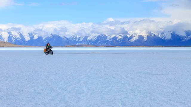 hehe, people are riding their motorbikes over the frozen lake of TsagaanNuur