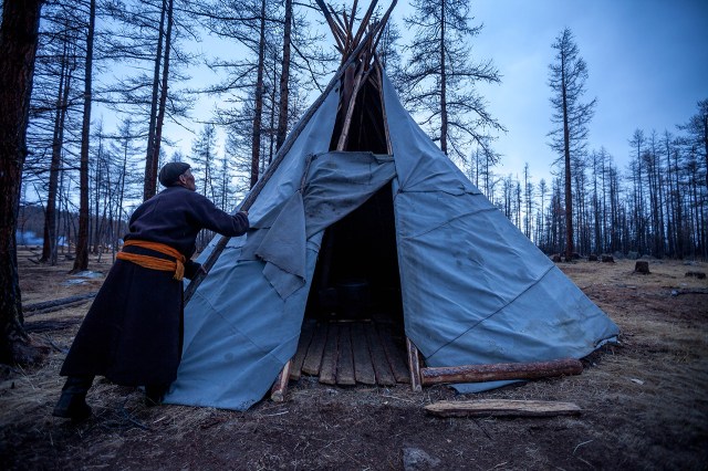 a Tsataan man was preparing my hut for the night