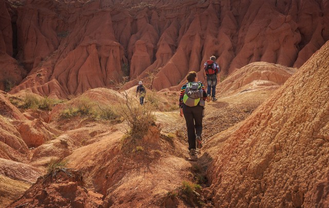 us exploring the surrounding canyon