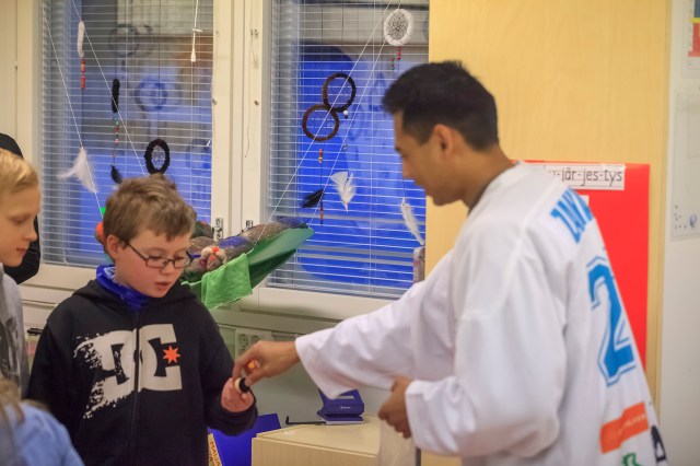 giving the kids some souvenirs from Kyrgyzstan