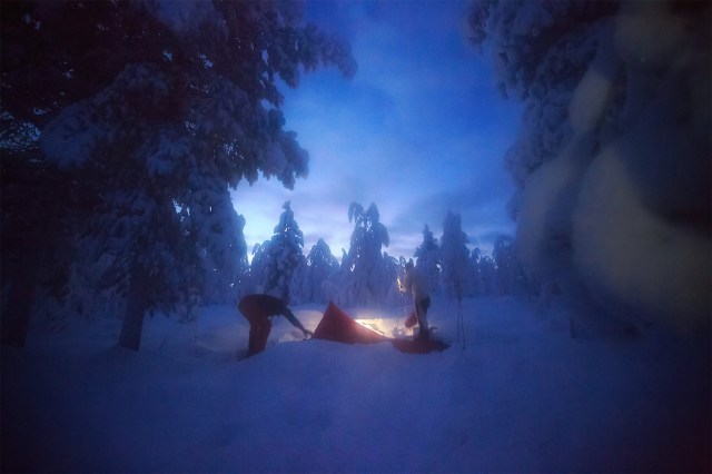 us adventurers preparing our camp in the forest